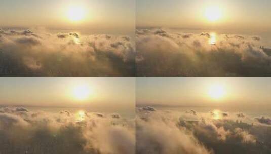 城市的上空金色的云雾飘荡高清在线视频素材下载