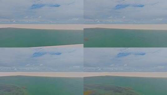 侧身旅行，白色沙丘，蓝绿的水在巴西的天堂高清在线视频素材下载
