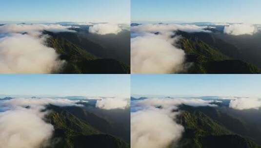 清晨鸟瞰山顶上流动的云雾高清在线视频素材下载