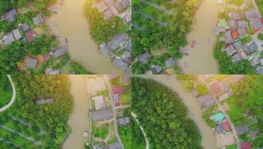 乡村运河边渔村的鸟瞰图高清在线视频素材下载