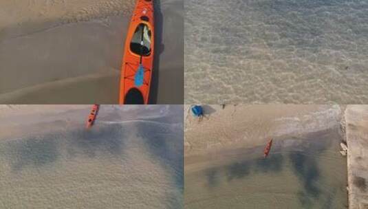 航拍一艘皮艇停靠在海滩岸边高清在线视频素材下载