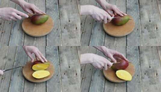 在厨房切了一个起皱的芒果。芒果切成块。高清在线视频素材下载