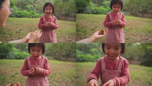 小女孩在公园里玩耍探索自然高清在线视频素材下载