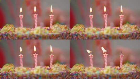 在五颜六色的蛋糕上点蜡烛高清在线视频素材下载
