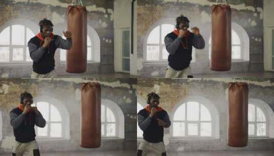 拳击手在健身房练习拳击高清在线视频素材下载