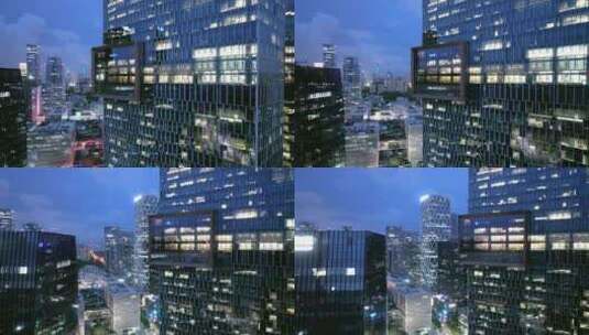蓝调夜景航拍腾讯滨海大厦百度国际大厦高清在线视频素材下载