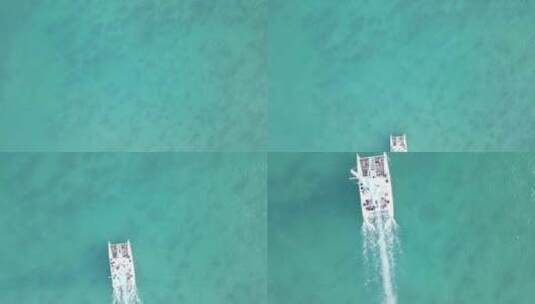 航拍小船穿过蔚蓝的海洋高清在线视频素材下载