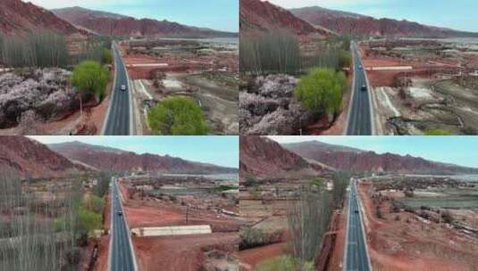 春天汽车行驶在新疆红山谷公路上高清在线视频素材下载