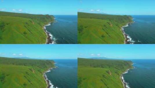 蓝色海浪的泡沫在火山岩中破裂高清在线视频素材下载
