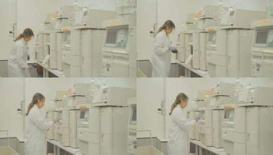 在实验室的HPLC机器中清洁自动进样器的高清在线视频素材下载