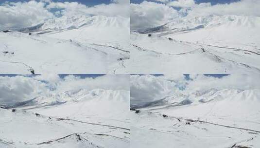 青海拉脊山蓝天白云雪山航拍视频高清在线视频素材下载