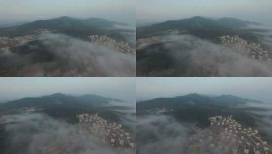 威海市环翠区里口山下的平流雾航拍4K高清在线视频素材下载