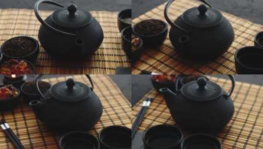 竹席上的黑色茶具高清在线视频素材下载