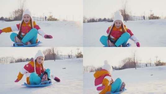 女孩在雪山上骑雪橇高清在线视频素材下载