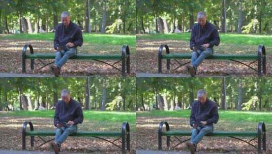 中年男人坐在公园长椅上高清在线视频素材下载