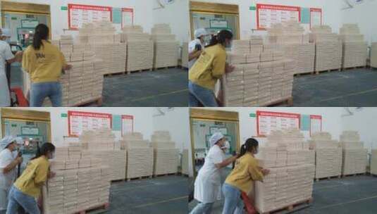 粮食现代化加工工厂工人转运袋装大米高清在线视频素材下载