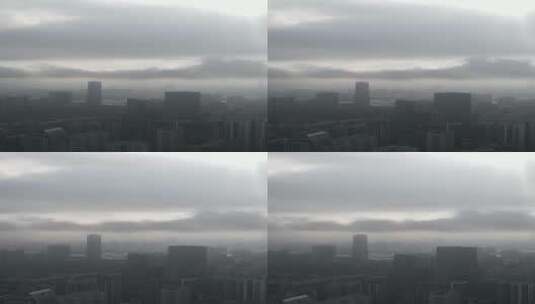 航拍云雾中的城市高清在线视频素材下载