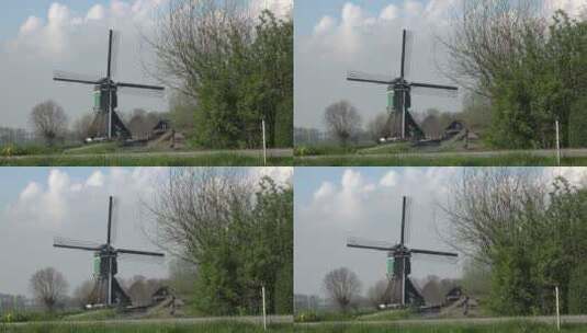 道路旁的风车景观高清在线视频素材下载
