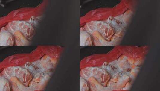 红色塑料袋里的冷冻肉特写镜头高清在线视频素材下载