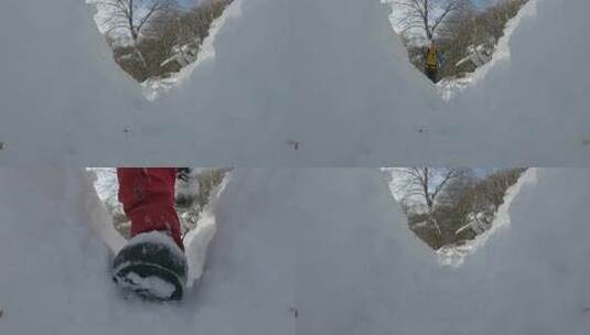 徒步旅行者拿着杆子在雪地里行走的低角度拍摄高清在线视频素材下载