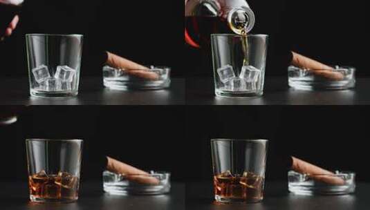 将威士忌倒入装有冰块的玻璃杯中的特写镜头高清在线视频素材下载