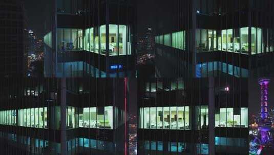 现代城市玻璃幕墙写字楼办公室夜景高清在线视频素材下载
