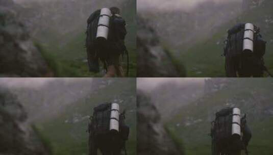 徒步在云雾山涧的男子高清在线视频素材下载