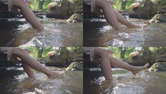 在小溪流里洗脚清新自然游山玩水高清在线视频素材下载
