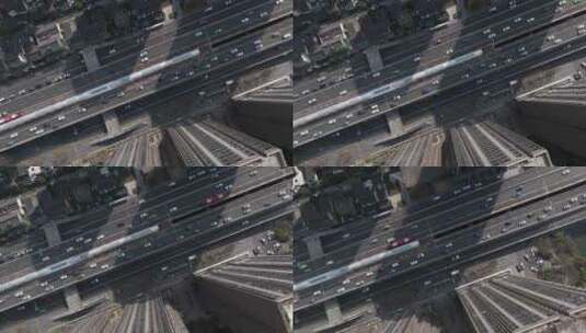 高角度航拍城市高楼下的道路车流成都二环路高清在线视频素材下载