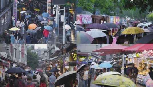 4K小吃街道打伞人群高清在线视频素材下载
