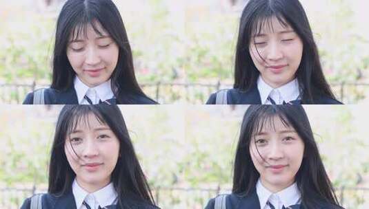 屋外笑可人女子学生高清在线视频素材下载