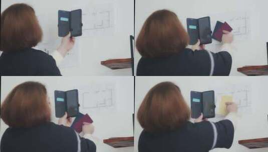 一个女人用她的智能手拍照片高清在线视频素材下载