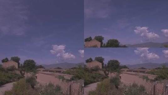 蓝天白云下的农村砖瓦房高清在线视频素材下载