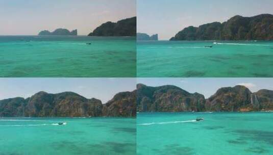 泰国皮皮岛果冻海长尾船跟随镜头高清在线视频素材下载