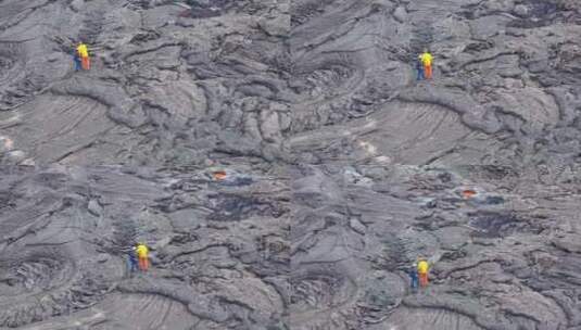 研究人员研究火山熔岩湖的岩浆流动高清在线视频素材下载