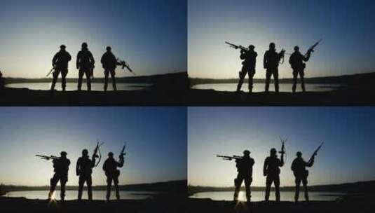三个士兵的剪影用枪打出了标语高清在线视频素材下载