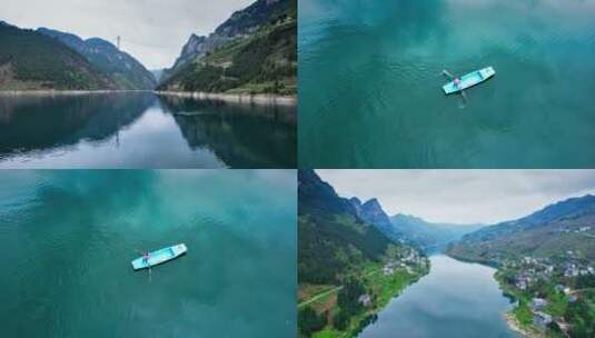 山间清澈的河面上划船高清在线视频素材下载