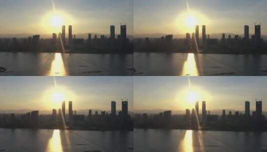 南昌红谷滩双子塔日落逆光航拍高清在线视频素材下载