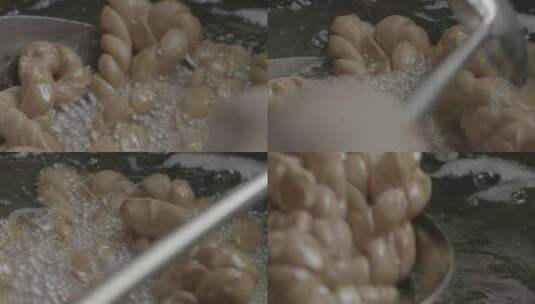 油炸麻花面食制作LOG高清在线视频素材下载