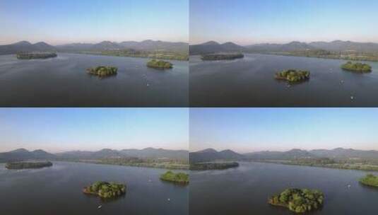 航拍蓝天下杭州西湖景色高清在线视频素材下载
