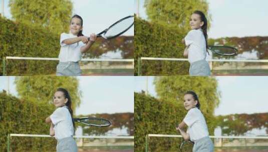 女孩在球场练习打网球高清在线视频素材下载