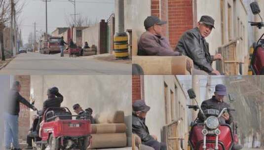 农村老人坐在路边晒太阳抽烟闲聊高清在线视频素材下载