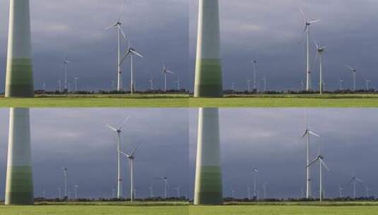 农田上的风力发电机高清在线视频素材下载