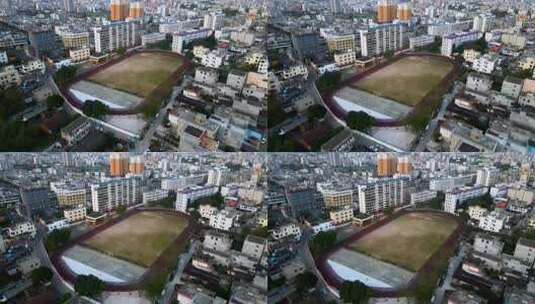 海南省万宁市市区城市足球场航拍高清在线视频素材下载