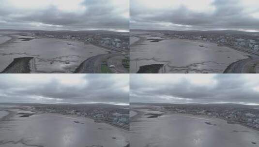 空中推进兰开夏郡多云的莫克姆湾高清在线视频素材下载