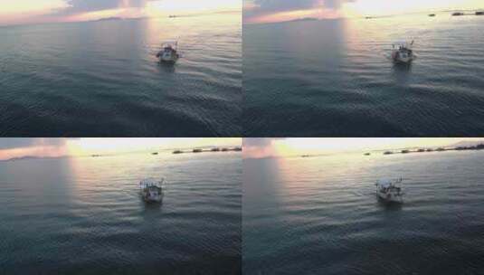 驶向夕阳的渔船高清在线视频素材下载