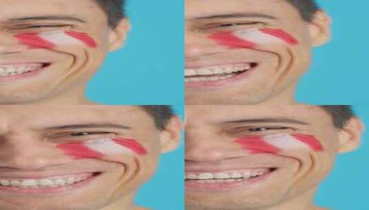 脸上画着秘鲁国旗微笑的男人高清在线视频素材下载