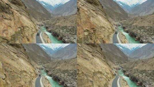 巴基斯坦斯卡杜山区悬崖旁卡车驶过JSR路高清在线视频素材下载