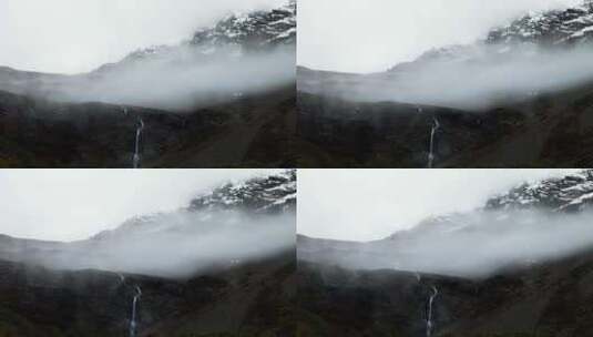 阿坝州小金县小二普牧业村结斯沟的雪山瀑布高清在线视频素材下载