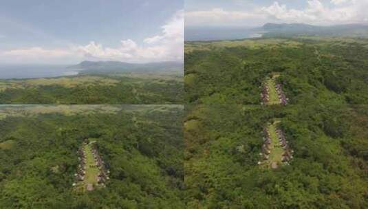 鸟瞰村庄和森林，弗洛雷斯，印度尼西亚。高清在线视频素材下载